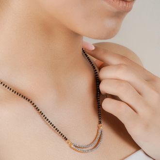 DOUBLE SEMI CIRCLE DIAMOND PENDANTS